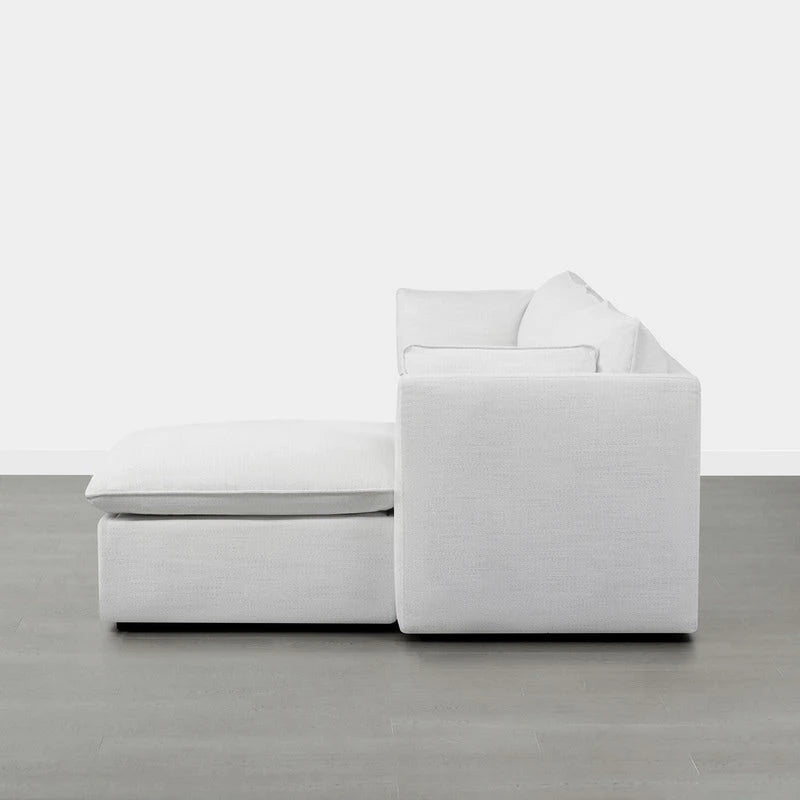 Canapé d'angle avec repose-pieds